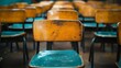 © Generative AI - selective soft and blur focusold wooden row lecture chairs in classroom in poor schoolstudy room without studentconcept for education in Third world : Generative AI