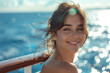 © Stopho Luv - On a sunny summer morning, Caucasian brunette woman stood on deck of cruise ship, her eyes wide with wonder as she took in panoramic view of sparkling sea, feeling warm breeze on her skin and revelin