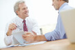 © ReeseBuyout2/peopleimages.com - Meeting, discussion and business men on tablet for planning, online project and website in office. Corporate company, collaboration and people on digital tech for research, internet and consulting