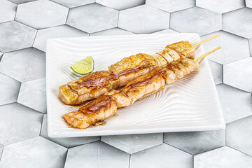 Wall Mural - Grilled salmon skewer with sauce