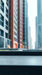 Wall Mural - Empty Black Marble Counter Top With Blurred Modern Building Background