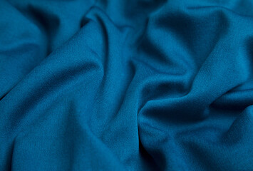 Wall Mural - Blue fabric background. Selective focus.