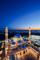 Wall Mural - Sunset landscape Nur-Sultan, Kazakhstan largest big white mosque in Central Asia, Astana Aerial drone view