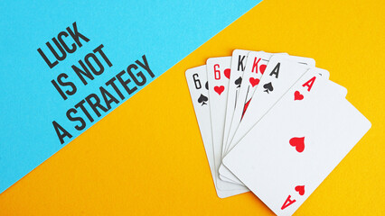 Luck is not a strategy is shown using the text and photo of cards