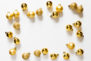 Wall Mural - golden new year's balls. frame, christmas composition with balls. top view, flat lay. empty space fo