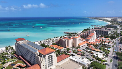 Wall Mural - Palm Beach At Noord In Oranjestad Aruba. Beach Landscape. Caribbean Paradise. Noord At Oranjestad Aruba. Seascape Outdoor. Nature Tourism.