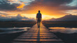 © James - Silhouetted man standing on wooden pier overlooking tranquil lake at sunset with dramatic orange sky and mountain landscape, copy space