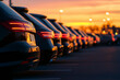© Anastasiia Ignateva - Sunset Perspective of Parked Cars. A row of parked cars at sunset with glowing tail lights.