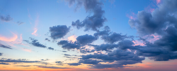Wall Mural - gentle ligth colors of sunrise sundown sky with pastel light clouds, real sky photo. real sky clouds