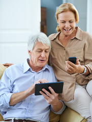 Canvas Print - Relax, smile and technology with senior couple streaming on sofa in living room of home together. Internet, phone or tablet with elderly man and woman in apartment for retirement bonding or browsing