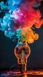 © qorqudlu - A light bulb releasing vibrant, colorful smoke against a dark background, symbolizing the flow of creativity and ideas.