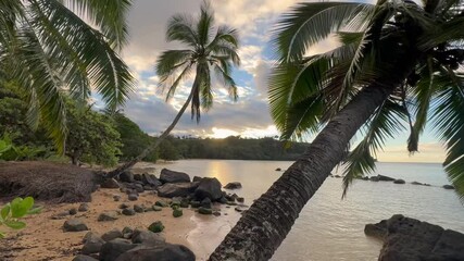 sunset time at the beach on the north shore of kauai, hawaii
