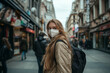 © Zarecznaya - Long-Haired European or American tourist Wearing a Protective Mask on the Street in the Autumn