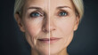 © Darya - This captivating visual presents a woman's face divided in half, revealing the contrast between aging signs and skin rejuvenation, middle-aged girl before and after facelift and facial surgery, botox