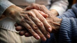 © Margo Miro - Sister's Hands Holding Elderly Man's Hand in a Supportive Touch