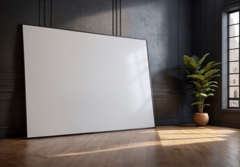 Wall Mural - A large white framed picture sits in a room with a window and a potted plant. The room is empty and the white frame contrasts with the dark walls