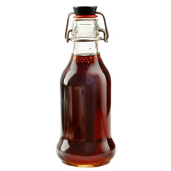 A glass bottle with a metal swing top lid filled with a dark brown liquid, possibly maple syrup, isolated on a white background.