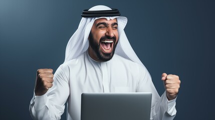 happy arab businessman with a laptop