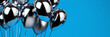 © Luluraschi - metallic silver balloons on blue background, horizontal banner