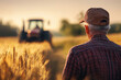 © Paulina - happy farmer in a cap in front of a wheat field and a tractor driving on it, wheat import, grain import, generative AI