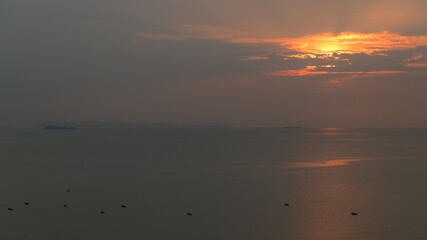 Wall Mural - beautiful view of golden sea and sky in the evening, natural background