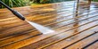 © A.Rod - Pressure washer cleaning wooden deck with water droplets and dirt flying, pressure washer, blasting