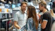 © Nuth - Customer and sales representative engaging in discussion about household appliances in a busy electronics store, focused on the latest models.