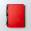 © Heng Heng - AI Stock - A Striking Flat Lay Image of a Vibrant Red Notebook Resting Centered on a Crisp Clean White Background Showcasing a Minimalist and Elegant Office or Workspace Aesthetic