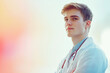 © Keitma - Young male medical student looking confident with hope in the future and the field of medicine , portrait of a young guy with copy space over bright and colorful background