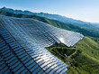 © zhu difeng - view of solar power station on green hill