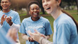 © LuxeShutter24/peopleimages.com - Applause, volunteer and happy people in park for charity event, community service and teamwork. Volunteering, smile and men and women excited, cheer and celebrate for donation, ngo and outreach goals