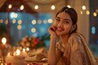 © Tawassul - A beautiful woman in an elegant saree, sitting at the dining table with her hand on one cheek and smiling softly as she looks towards the camera