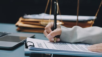 Wall Mural - Business and lawyers discussing contract papers with brass scale on desk in office. Law, legal services, advice, justice and law concept picture with film grain effect