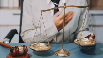 Wall Mural - Business and lawyers discussing contract papers with brass scale on desk in office. Law, legal services, advice, justice and law concept picture with film grain effect