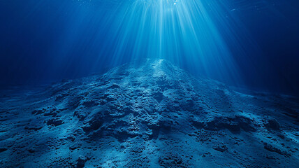 Wall Mural - a seamount under the deep blue ocean, highlighted by rays of light