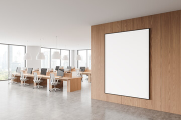 Wall Mural - Modern open space office with blank framed poster on wooden wall. 3D Rendering