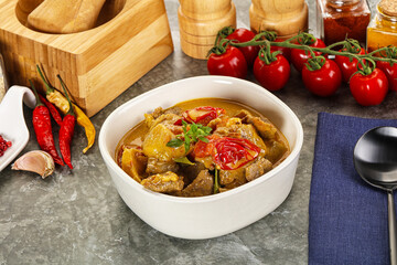 Wall Mural - Yellow THai curry with beef