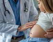 © Nattapat - Closeup of an unrecognizable pediatrician palpating the stomach of a child lying on a cot in a medical clinic during a physical examination