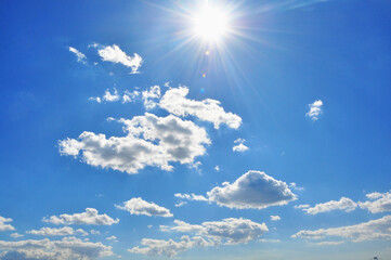 White clouds in blue sky at sunny day