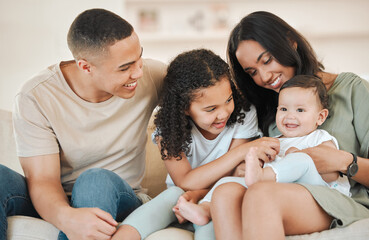 Poster - Happy, love and parents with baby and child in home for bonding, connection or family time. Smile, fun and young mother and father holding infant with girl kid sibling in living room at house.