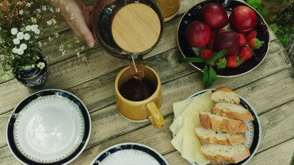 Wall Mural - Outdoor tea party or rural morning breakfast. 