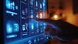 © keetazalay - A close-up of a person's hand using a touchscreen interface to control smart home lighting and temperature, with the screen displaying various options and settings, highlighting the customization and
