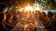 © Worawee - A group of people are gathered around a long table with food and drinks
