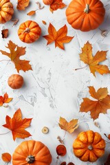 Autumn decoration with orange pumpkins and leaves on a white table. Seasonal fall background concept.