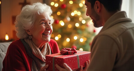 Happy grandma receiving holiday gift