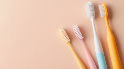 colorful toothbrushes arranged neatly on a soft beige backdrop, highlighting dental hygiene essentia