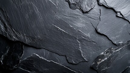 Black slate background or dark gray stone texture for design