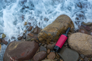 Sticker - Bottle of wine by the sea