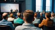 © VistaVisions - Speaker giving presentation in hall at university workshop in front of audience or conference hall. Rear view of participants with softly blurred presenter. Scientific conference event, training