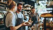 © Oulaphone - Service professional worker assisting a customer with a smile in restaurant or cafe.